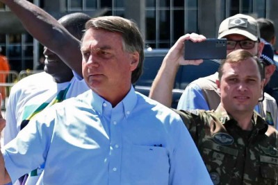 Mauro Cid e Jair Bolsonaro -  (crédito: EVARISTO SA / AFP)