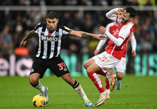 Guimarães em ação contra o Arsenal -  (crédito: Oli SCARFF / AFP)