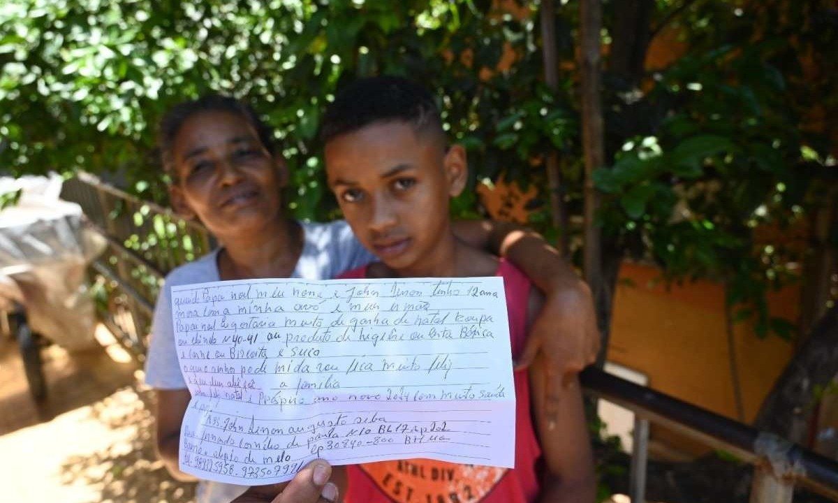 Menino de Belo Horizonte que pediu cesta básica como presente de Natal ao Papai Noel -  (crédito: Leandro Couri/EM/D.A. Press)