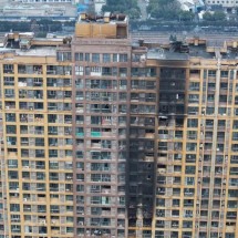 Incêndio em edifício residencial deixa ao menos 15 mortos no leste da China - -STR / AFP