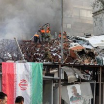 Ataque israelense mata ao menos oito pessoas e destrói embaixada iraniana - LOUAI BESHARA / AFP