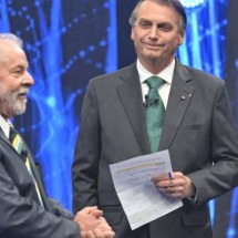 Lula e Bolsonaro disputam queda de braço por vetos no Congresso - AFP/REPRODUÇÃO