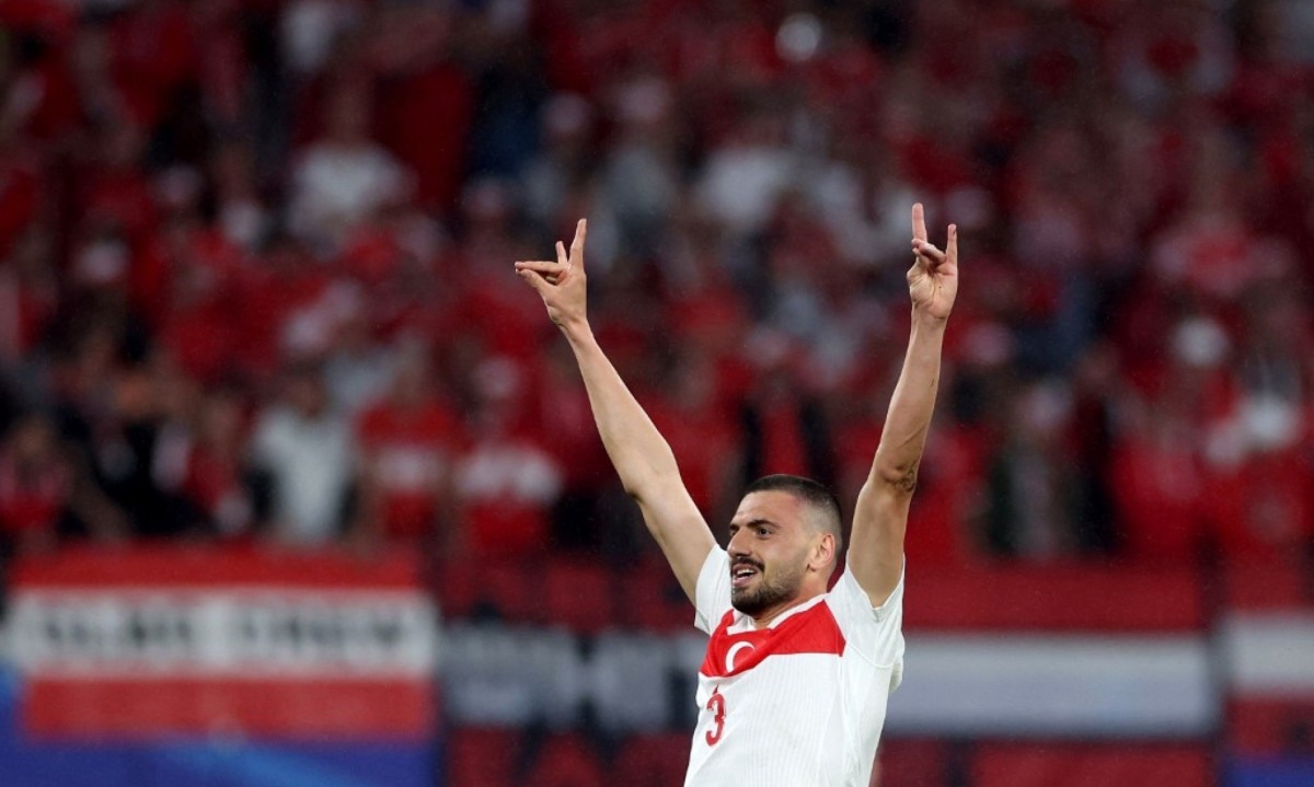  Turkey's defender #03 Merih Demiral makes a controversial hand gesture as he celebrates scoring his team's second goal during the UEFA Euro 2024 round of 16 football match between Austria and Turkey at the Leipzig Stadium in Leipzig on July 2, 2024. UEFA said on July 3, 2024 it had opened a probe into Turkey defender Merih Demiral for celebrating a goal in the team's 2-1 win against Austria at Euro 2024 with an allegedly ultra-nationalist salute. The tournament organiser said in a statement it was investigating the player for 