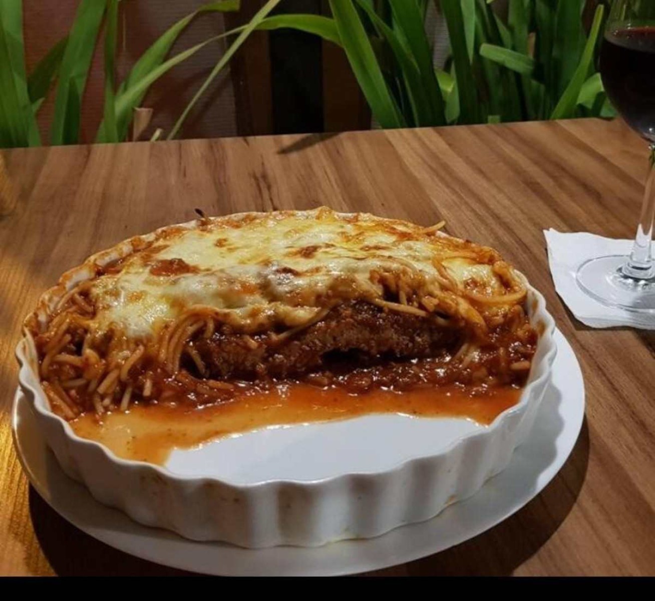 Pecado na Itália? Onde comer espaguete à parmegiana