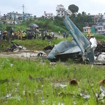 Piloto do avião que caiu no Nepal, único sobrevivente, recupera-se no hospital - PRAKASH MATHEMA / AFP