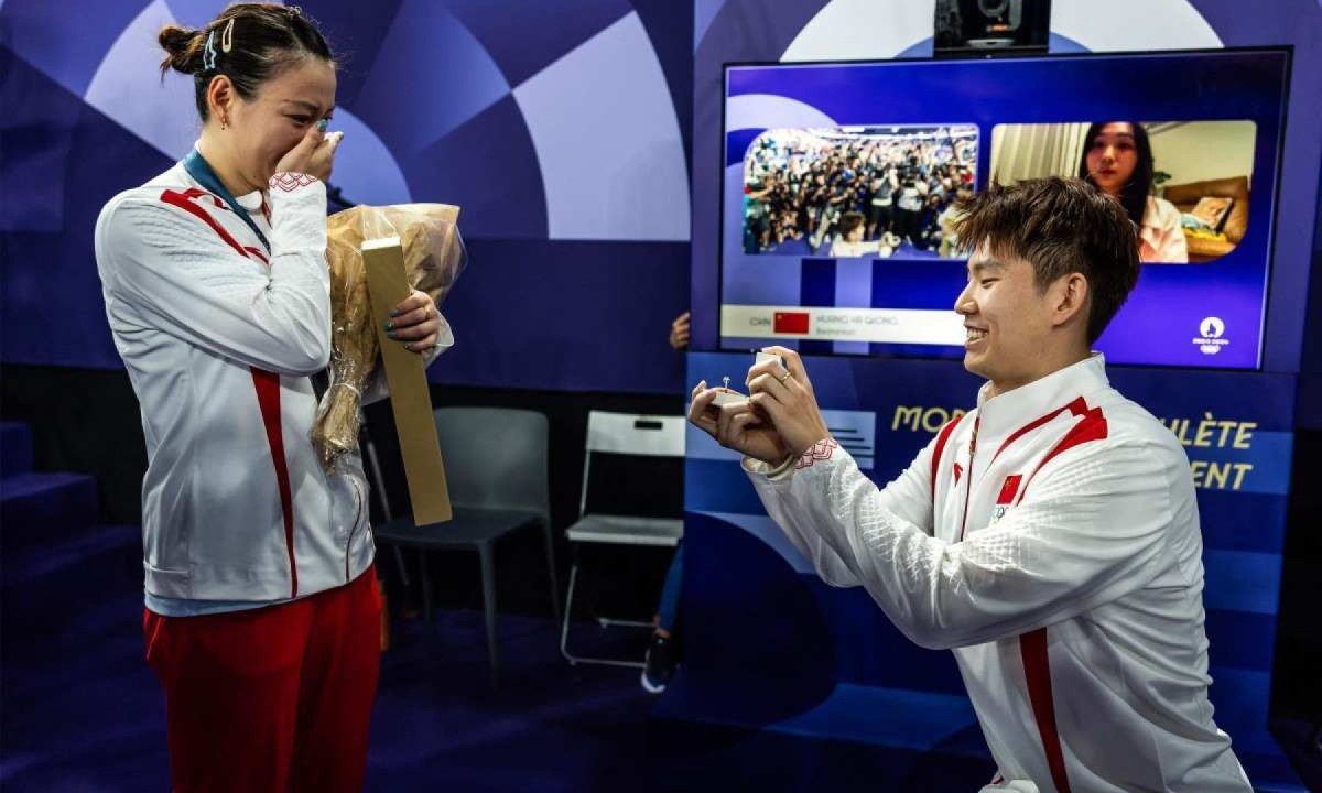 Pedido de casamento no pódio de Paris 2024 -  (crédito:  AFP)