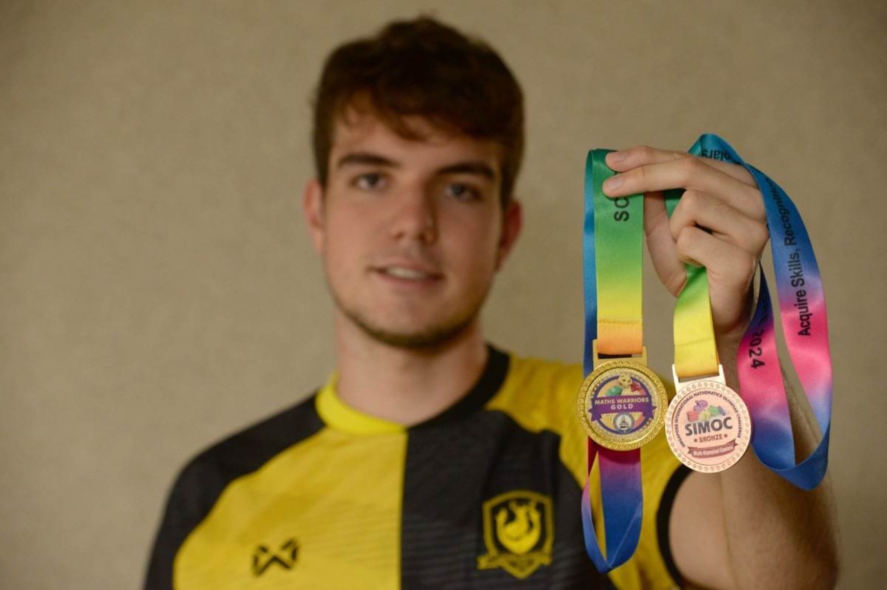 Estudante mineiro ganha medalhas de ouro e bronze em Singapura