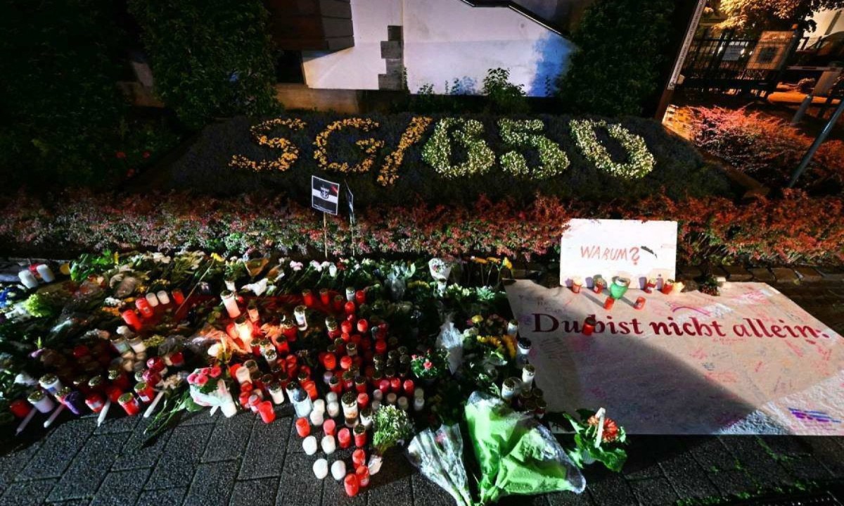  Candles and flowers and the inscription 