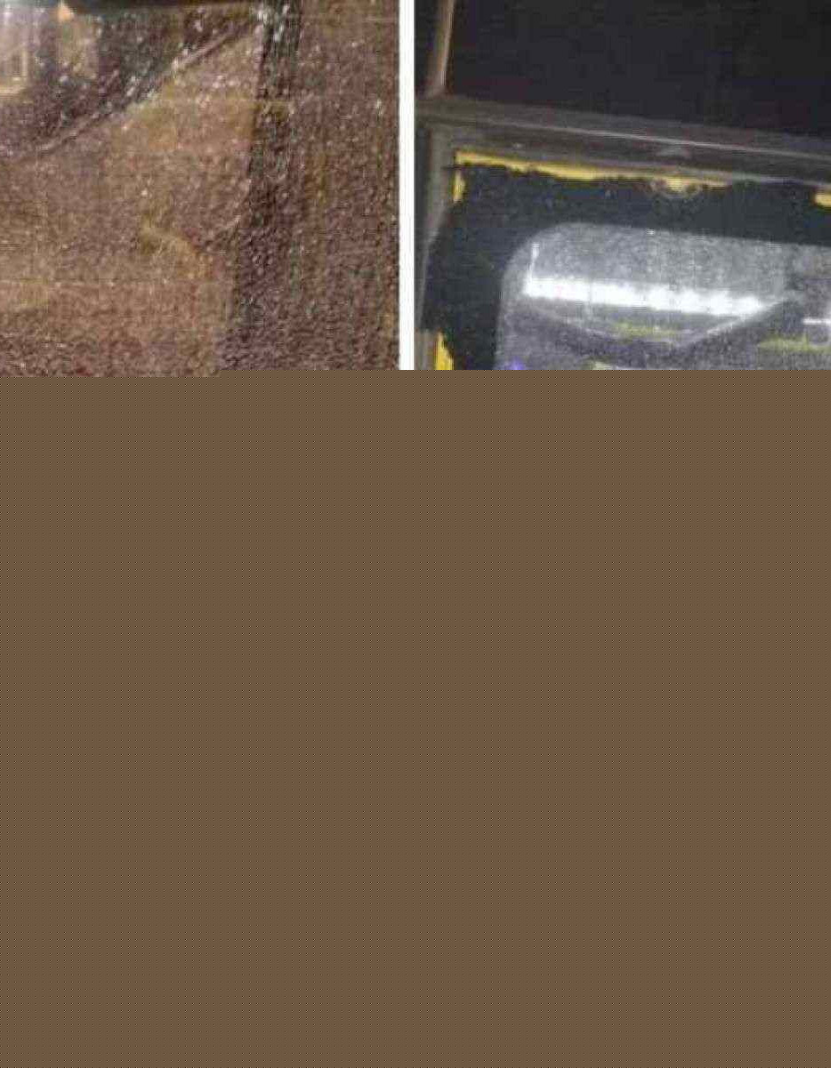 Vidro de janela do BRT ficou estilhaçado ao ser atingido por tiro -  (crédito: Reprodução / Redes sociais)