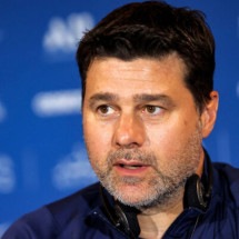  Paris Saint-Germain's Argentinian head coach Mauricio Pochettino gives a press conference during the spring training camp in Qatar's capital Doha on May 15, 2022. (Photo by KARIM JAAFAR / AFP) (Photo by KARIM JAAFAR/AFP via Getty Images)
       -  (crédito:  AFP via Getty Images)