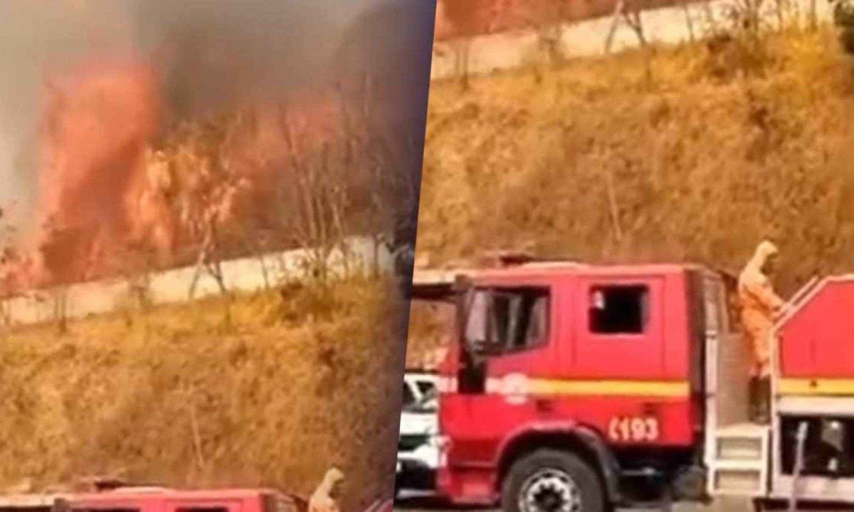 Duas viaturas do Corpo de Bombeiros foram mobilizadas para atuar em incêndio que avançava para batalhão da PM, em Ribeirão das Neves -  (crédito: Reprodução/redes sociais)