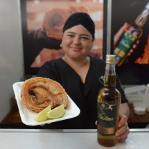 Torresmo de rolo é uma das atrações gastronômicas da Expo Favela -  Tulio Santos/EM/D.A.Press