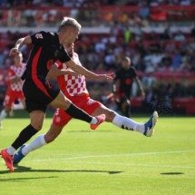  GIRONA, SPAIN - SEPTEMBER 15: Dani Olmo of FC Barcelona scores his team's third goal during the LaLiga match between Girona FC and FC Barcelona at Montilivi Stadium on September 15, 2024 in Girona, Spain. (Photo by David Ramos/Getty Images)
     -  (crédito:  Getty Images)
