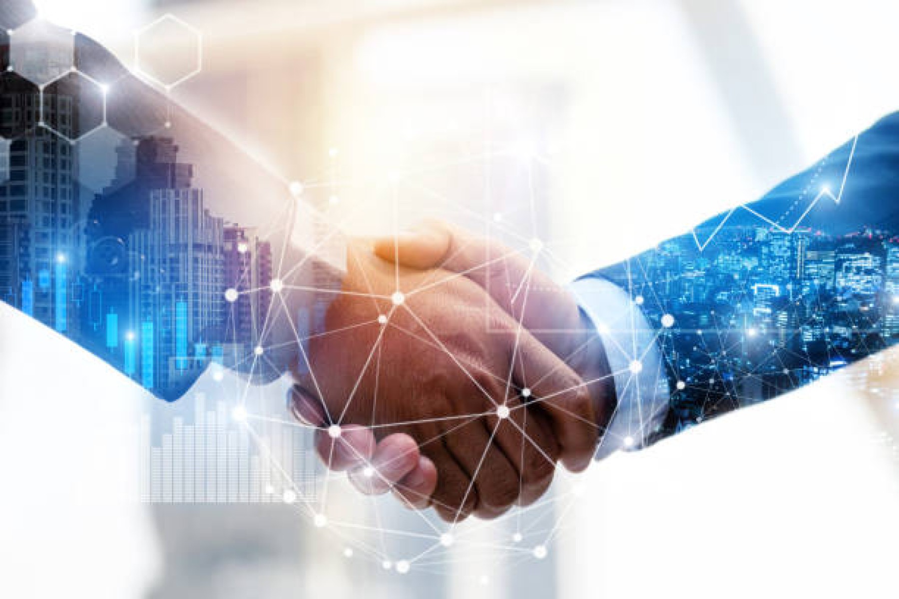  Business Partnership. business man investor handshake with effect global network link connection and graph chart of stock market graphic diagram, digital technology, internet and partnership concept
     -  (crédito:  Getty Images/iStockphoto)