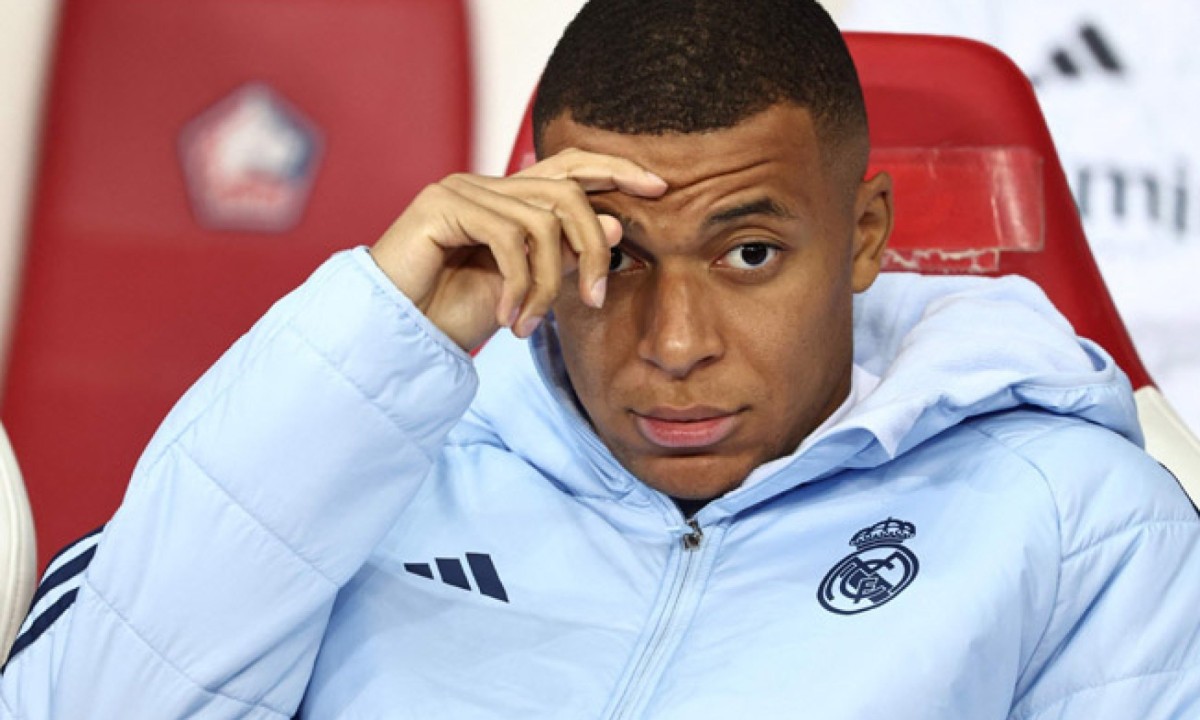  (FILES) Real Madrid's French forward #09 Kylian Mbappe looks on from the bench during the UEFA Champions League football match between Lille LOSC and Real Madrid at the Pierre Mauroy Stadium in Villeneuve-d'Ascq, northern France, on October 2, 2024. Kylian Mbappe is being investigated for rape by Swedish police, according to a newspaper report in Sweden following a visit by the Real Madrid star to Stockholm, which Mbappe denounced as 