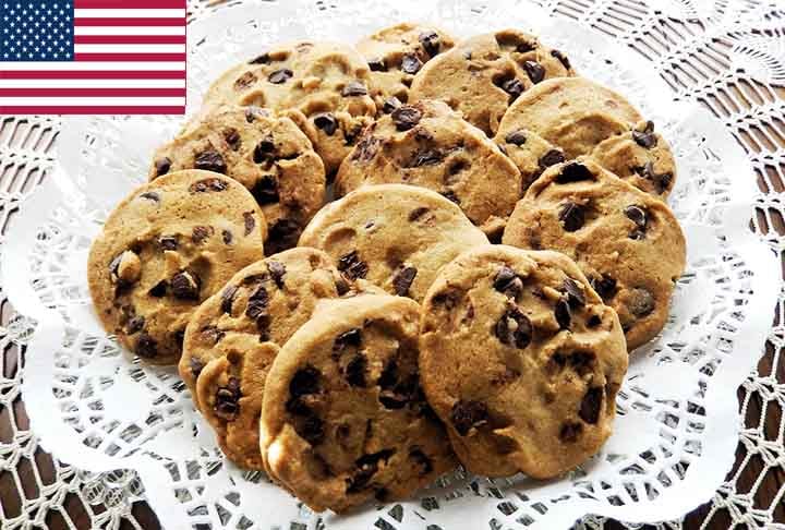 7º) Chocolate chip cookie (EUA): Típico cookie americano feito com uma massa básica de farinha, açúcar, manteiga e ovos. Além disso, é incrementado com pedaços de chocolate, geralmente na forma de gotas. 