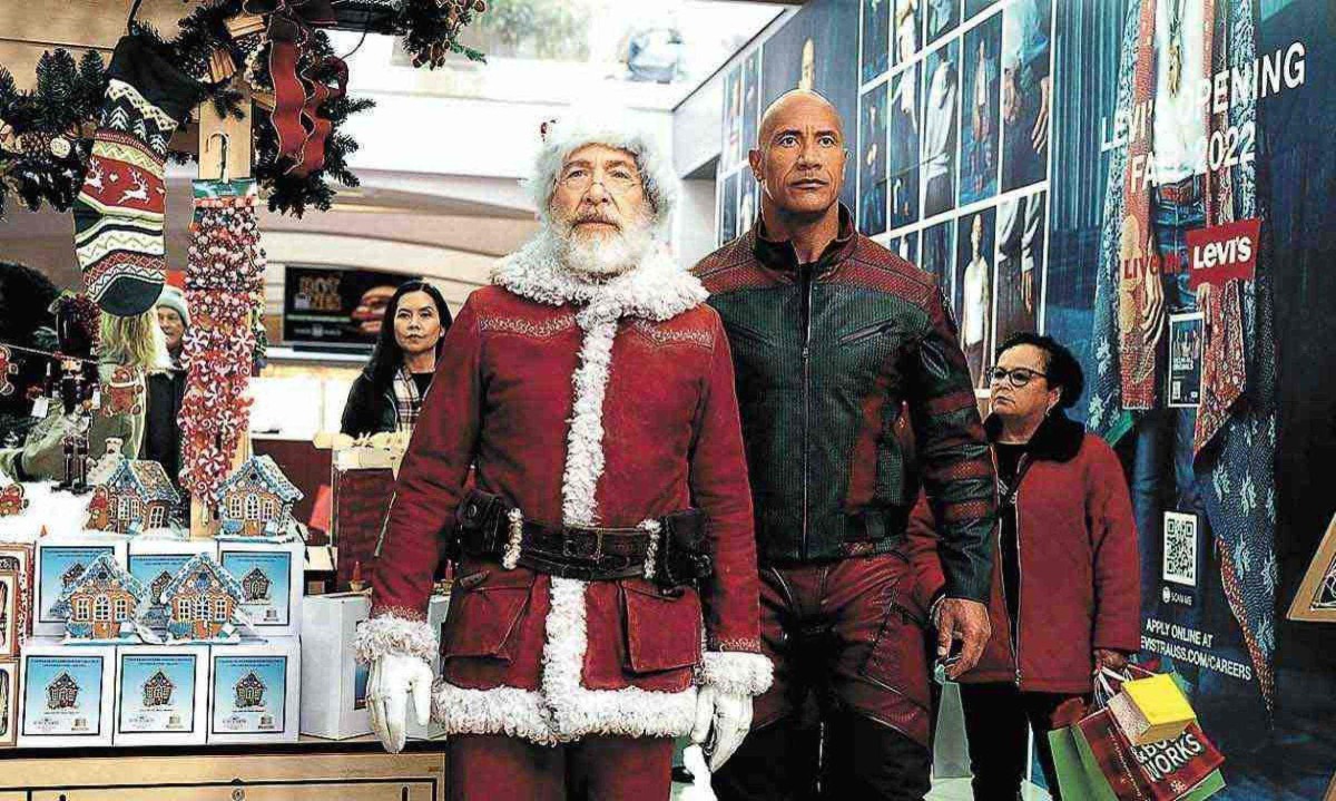 
J. K Simmons e Dwayne Johnson em 