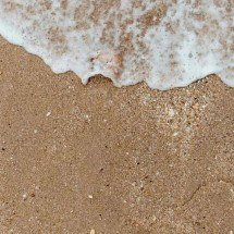 Férias em risco: areia da praia pode trazer problemas à saúde - Freepik