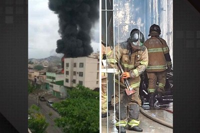 Coluna de fumaÃ§a vista de longe; incÃªndio destruiu fÃ¡brica de lenÃ§Ã³is, mesmo com trabalho dos bombeiros -  (crédito: ReproduÃ§Ã£o/RÃ¡dio Tupi)