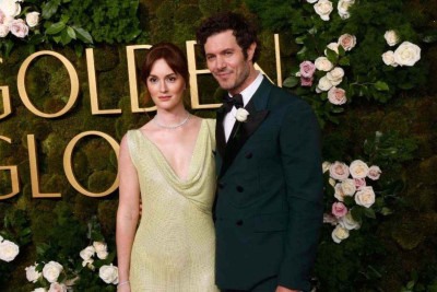 Leighton Meester e Adam Brody no Globo de Ouro -  (crédito: AFP)