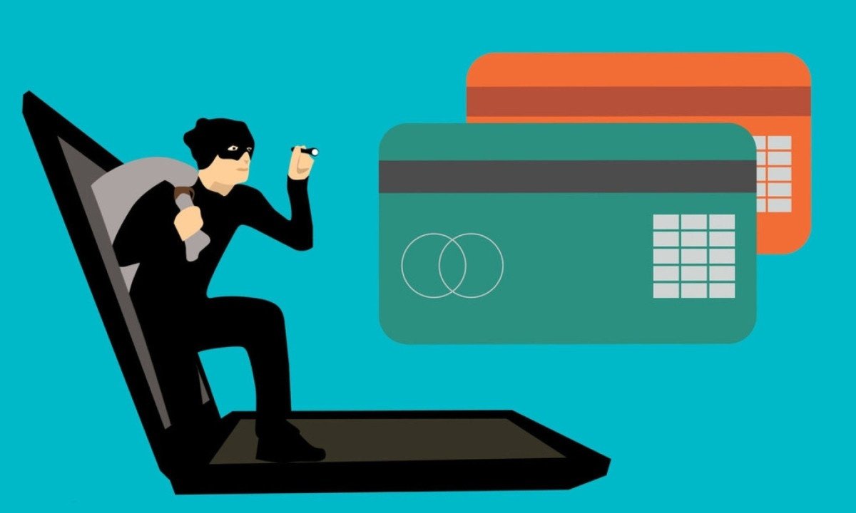 Ilustração mostra ladrão saindo de computador em direção a cartões de crédito -  (crédito: PxHere)