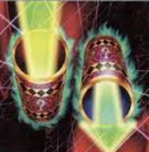 Nome da carta: Cilindro Mágico - Como a própria imagem da carta mostra, ela pega o ataque do seu adversário que iria para você e reverte para quem declarou o golpe. Uma das magias mais interessantes e famosas do anime. 