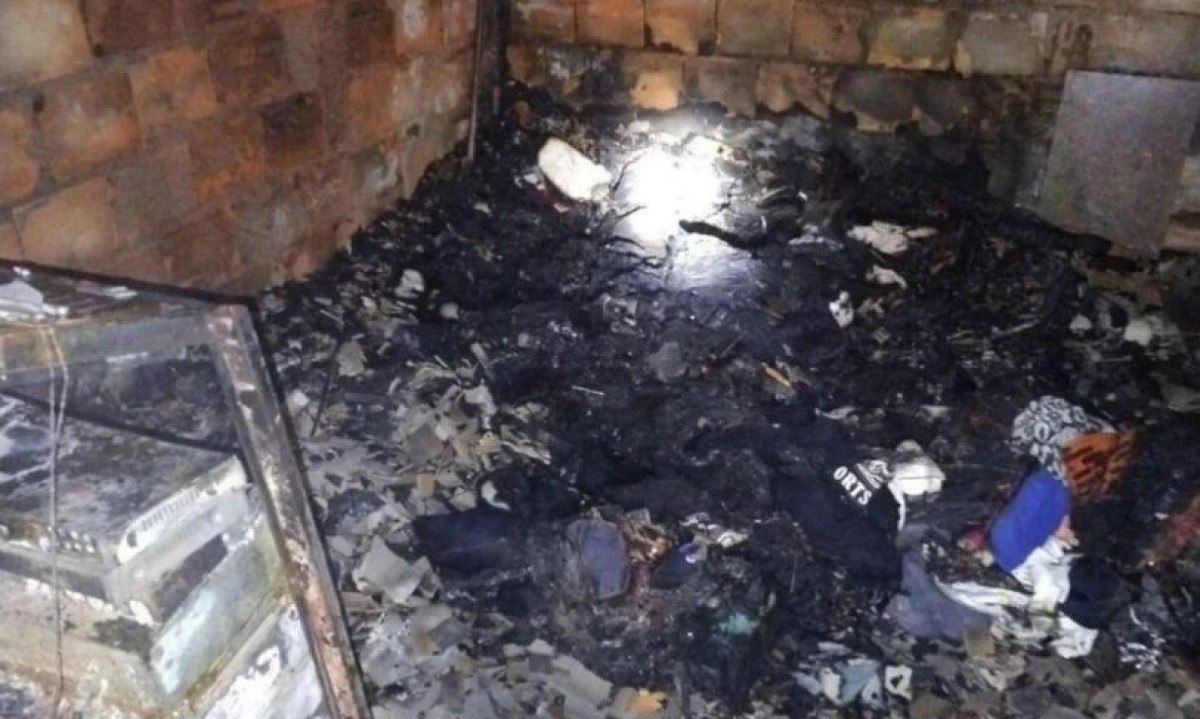 Mulher é suspeita de matar tio postiço a facadas e incendiar a casa dele em Governador Valadares -  (crédito: PMMG/Divulgação)