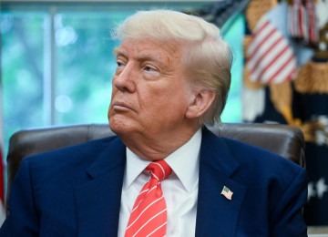 "A sombra da ameaça que Trump representa para o equilíbrio geopolítico e a economia globais levou os parlamentares alemães à cautela e os eleitores australianos a repelirem os conservadores" -  (crédito: Jim Watson/AFP)