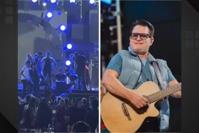Flagrante captado por fã durante show de momento em que Marrone é acudido pelos assistentes de palco depois de cair do palco -  (crédito: REPRODUÇÃO/REDES SOCIAIS)
