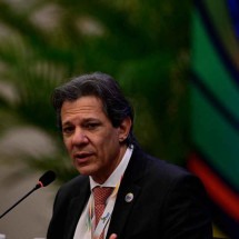 Desaquecimento desafia otimismo da Fazenda - Photo by Pablo PORCIUNCULA / AFP