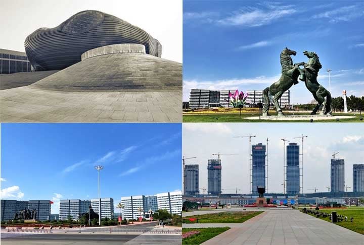 A cidade está localizada em uma área remota e árida, e o custo de vida é alto. Além disso, a economia da Mongólia Interior é instável, o que desencorajou os investidores. Hoje, o local é conhecido como uma “cidade fantasma”.