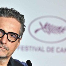  Ovação de 'O agente secreto' em Cannes surpreende Kleber Mendonça Filho - Xavier Galiana/AFP