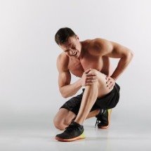 Dor muscular após a corrida: como evitar? - Freepik