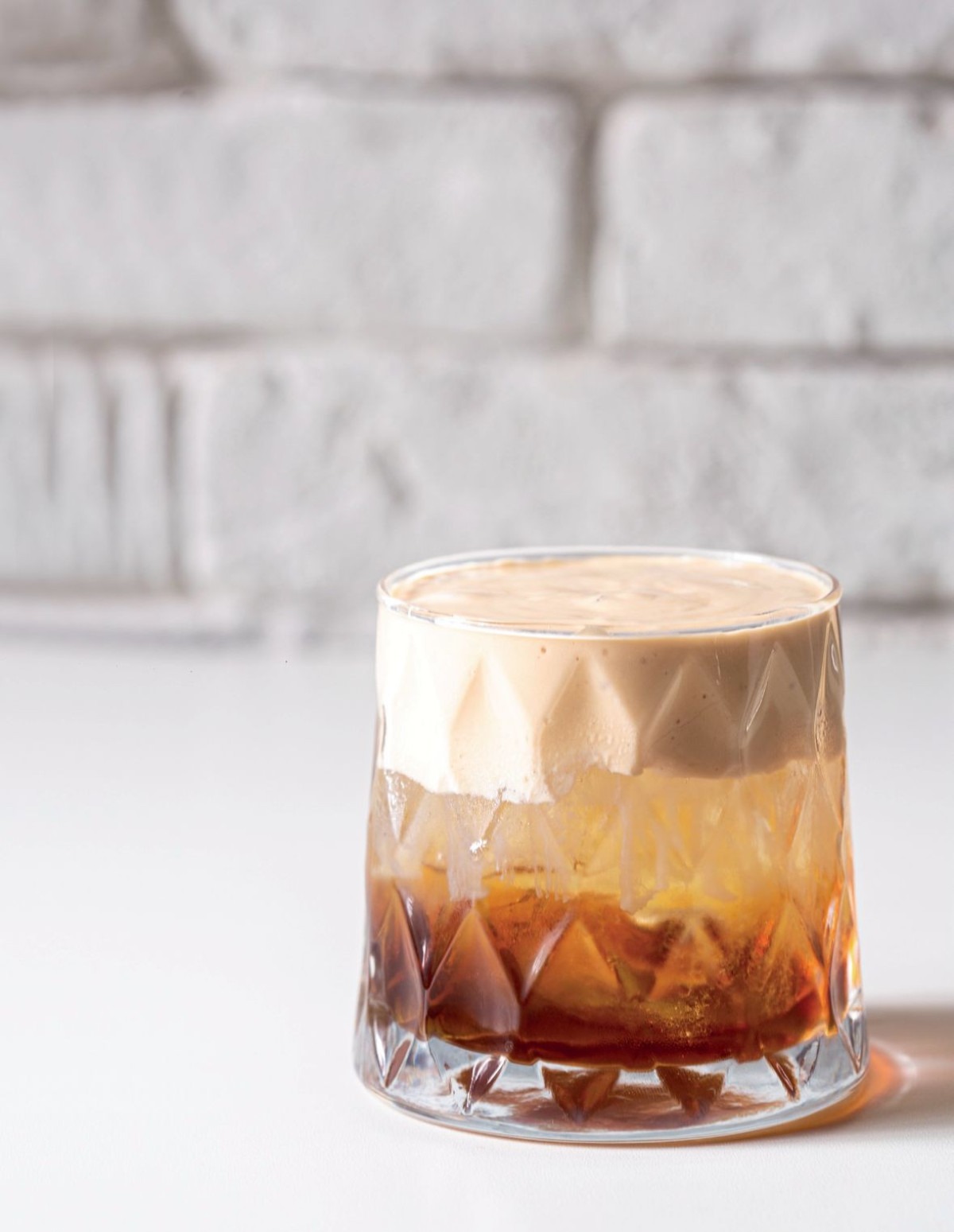 O drinque C.Q.C. do Cria Café mistura café, queijo e cachaça, três paixões mineiras