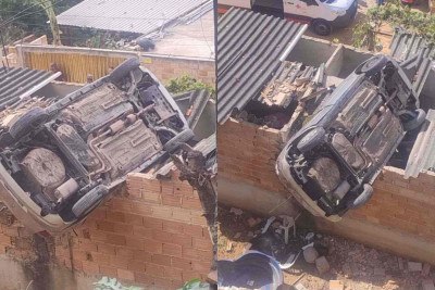 Um carro caiu em cima de uma casa na manhã deste domingo (1/6) na Região Norte de BH -  (crédito: CBMMG)