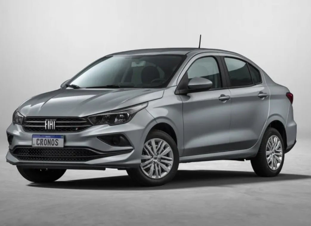 10. Fiat Cronos Drive 1.0 - 
A partir de R$ 100.990, vem com motor 1.0 Firefly de 75 cv e câmbio manual de 5 marchas.  Como sedã compacto, oferece amplo porta-malas de 525 litros, ar-condicionado e direção elétrica, ideal para famílias.  