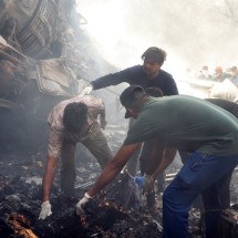 Índia: 204 corpos encontrados após acidente de avião - Sam PANTHAKY / AFP