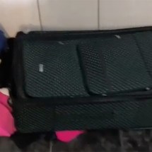 MG: homem se esconde dentro de mala para escapar da polícia - Reprodução de vídeo