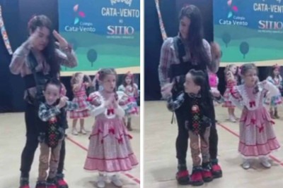 Professora usou colete especial para ajudar aluno com paralisia cerebral a dançar quadrilha -  (crédito: Reprodução)