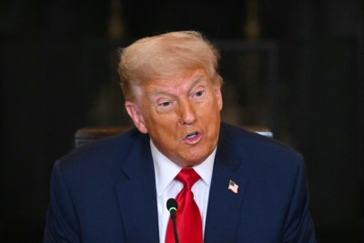 Presidente Donald Trump vem afirmando que julgamento do ex-presidente Jair Bolsonaro é injusto e deve ser encerrado; decisão de taxar o Brasil vem como retaliação -  (crédito:  Jim Watson/AFP)