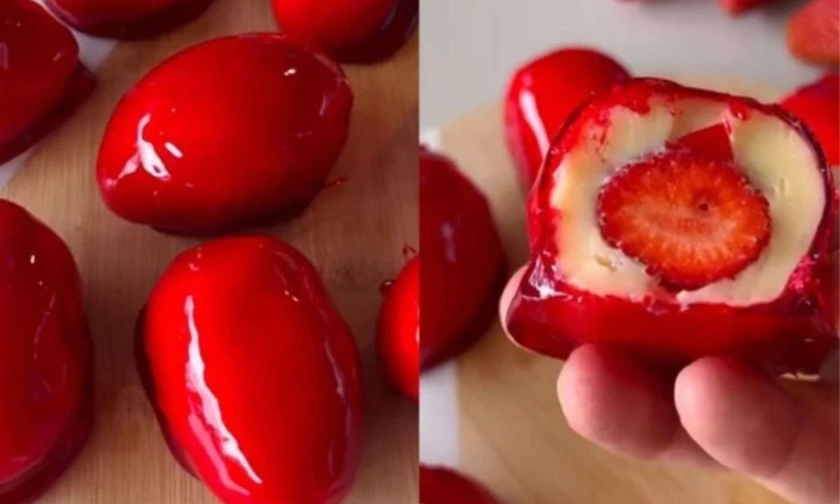 A receita de morango tem uma camada de brigadeiro e uma calda vermelha de açúcar crocante -  (crédito: Reprodução/Redes sociais)