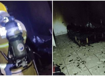 Bombeiros precisaram arrombar o portão de entrada e uma janela de um dos quartos para acessar o interior do imóvel -  (crédito: CBMMG/Divulgação)
