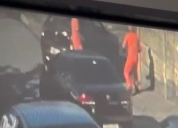Imagens de segurança flagraram momento em que o gari Laudemir de Souza Fernandes foi morto a tiro  -  (crédito: Redes sociais )