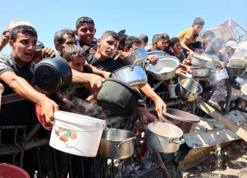 A guerra em Gaza mata e deixa milhares de palestinos famintos em uma luta insana por disputa de território
 -  (crédito: Omar AL-QATTAA/AFP )