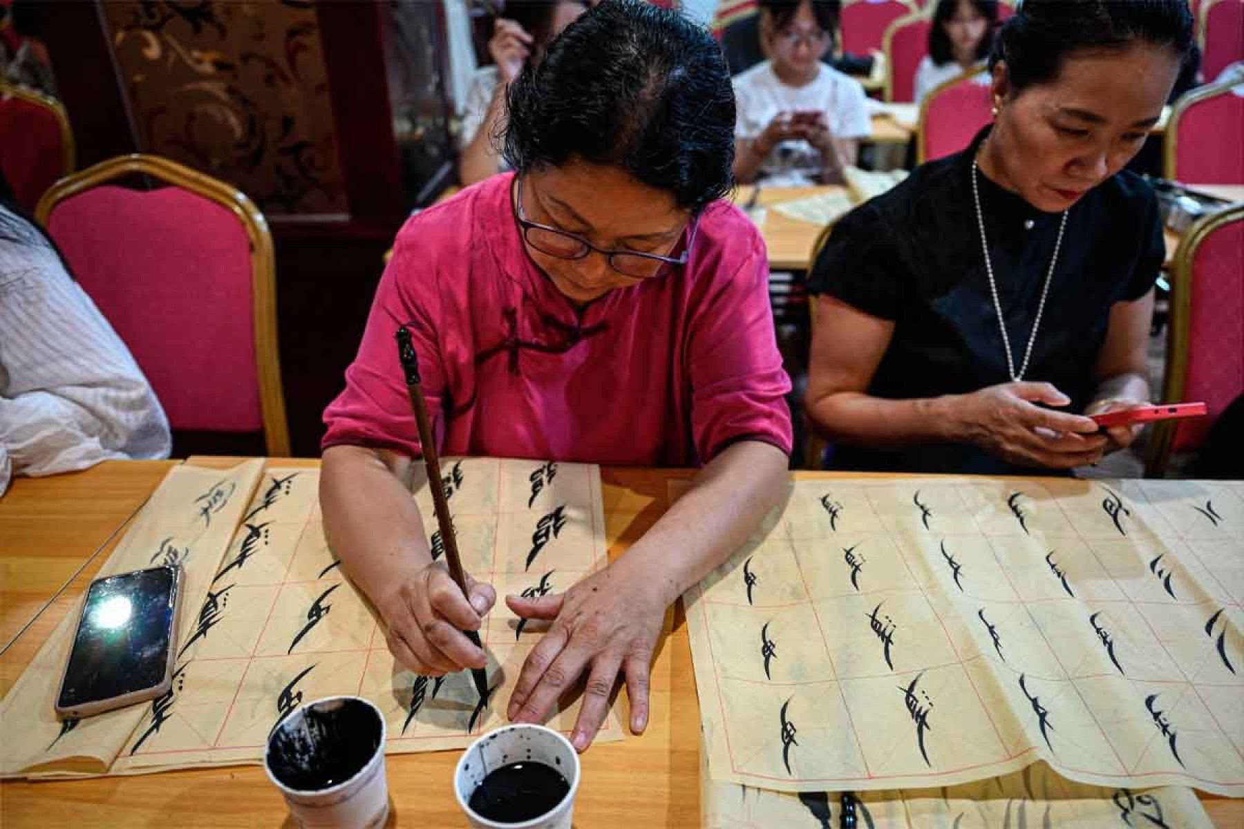 Aula de caligrafia Nüshu em Jiangyong