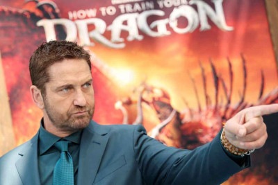 No documento enviado pelos manifestantes, eles pedem que o ator Gerard Butler seja desconvidado devido a sua posição política -  (crédito: Michael Tran /AFP)