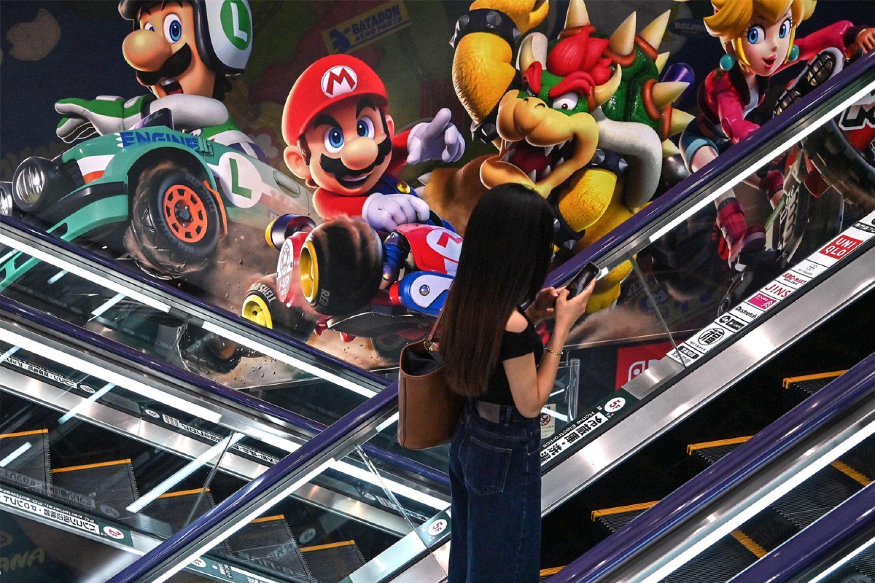 O sucesso de Super Mario Bros. levou ao desenvolvimento de muitos sucessores da série, como Mario Kart-Richard A. Brooks / AFP