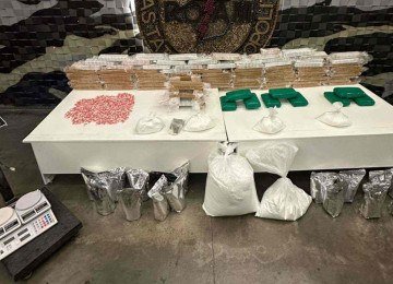 Em Santa Luzia, um dos suspeitos fazia a própria casa como depósito e fazia entregas a mando de terceiros -  (crédito: Divulgação/PMMG)