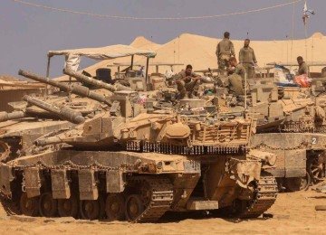 Forças israelenses começaram a recuar de partes do território, particularmente na Cidade de Gaza e Khan Yunis, informou a agência de defesa civil de Gaza -  (crédito: JACK GUEZ / AFP)