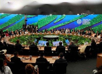 Mesa redonda de líderes: expectativa é que as discussões apontem modelos para serem desenvolvidos urgentemente -  (crédito: Ludovic MARIN/AFP)